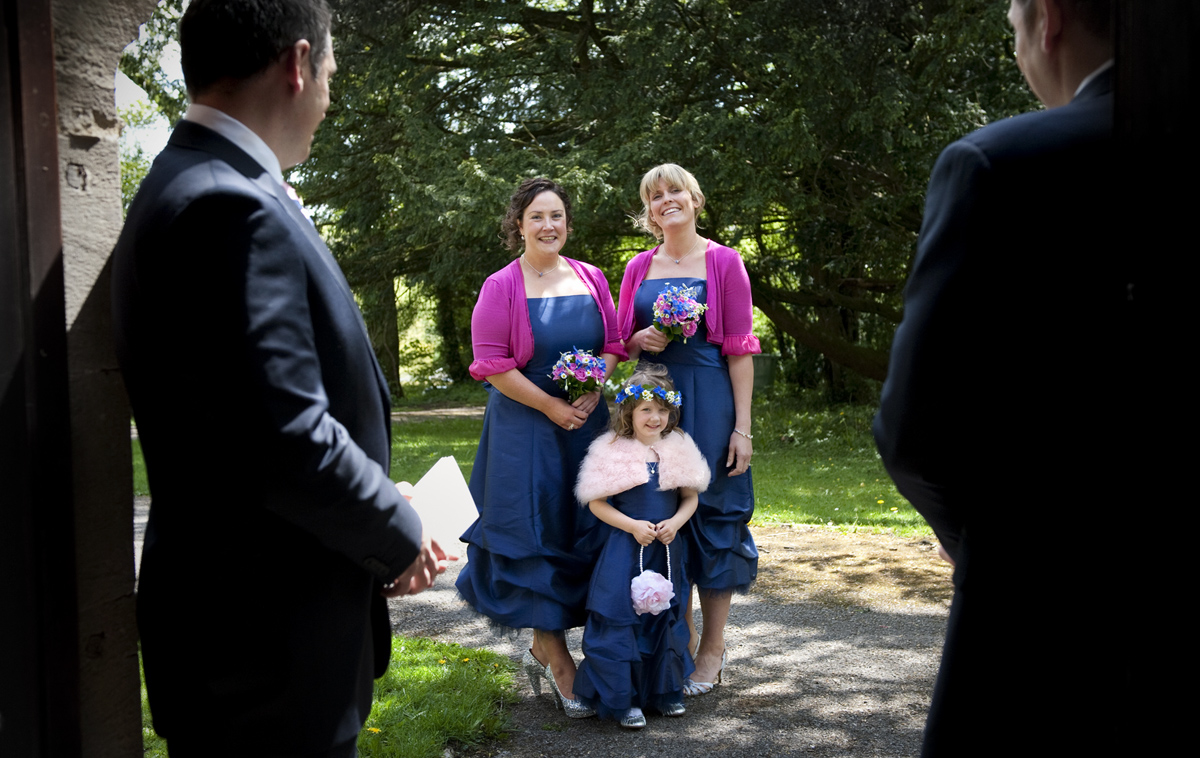 Pontyclun-wedding-photographers-bridesmaids-waiting-pontyclun-church-wedding-photography